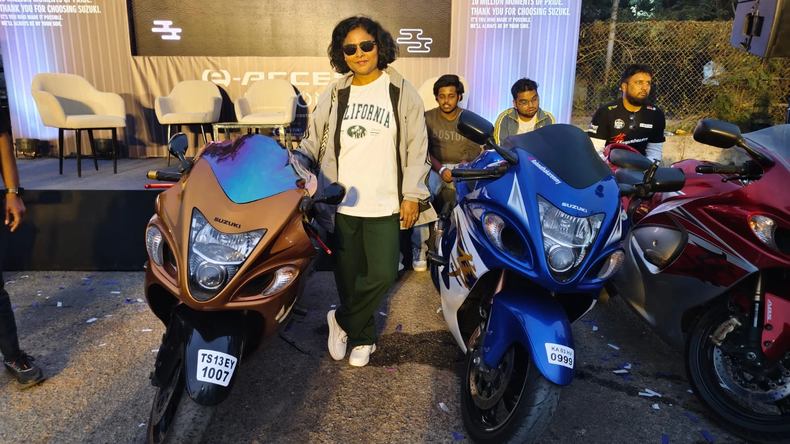 Suzuki motorcycles display with event guest at a premium motorcycling event by Genx9 Events